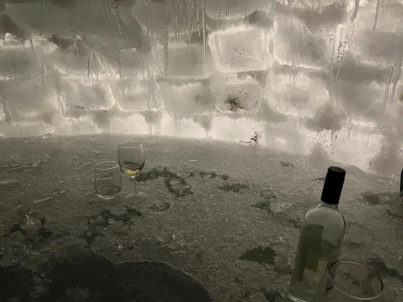 lights inside an igloo with celebration drinks